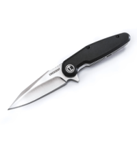 Crescent harpoon blade pocket knife with black handle on white background