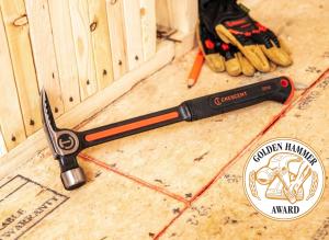 Crescent 22 oz steel framing hammer sitting on a plywood floor with work gloves in the back ground with the Golden Hammer Award winner logo
