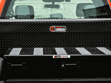 Black JOBOX truck box and drawer storage in the back of a pickup truck